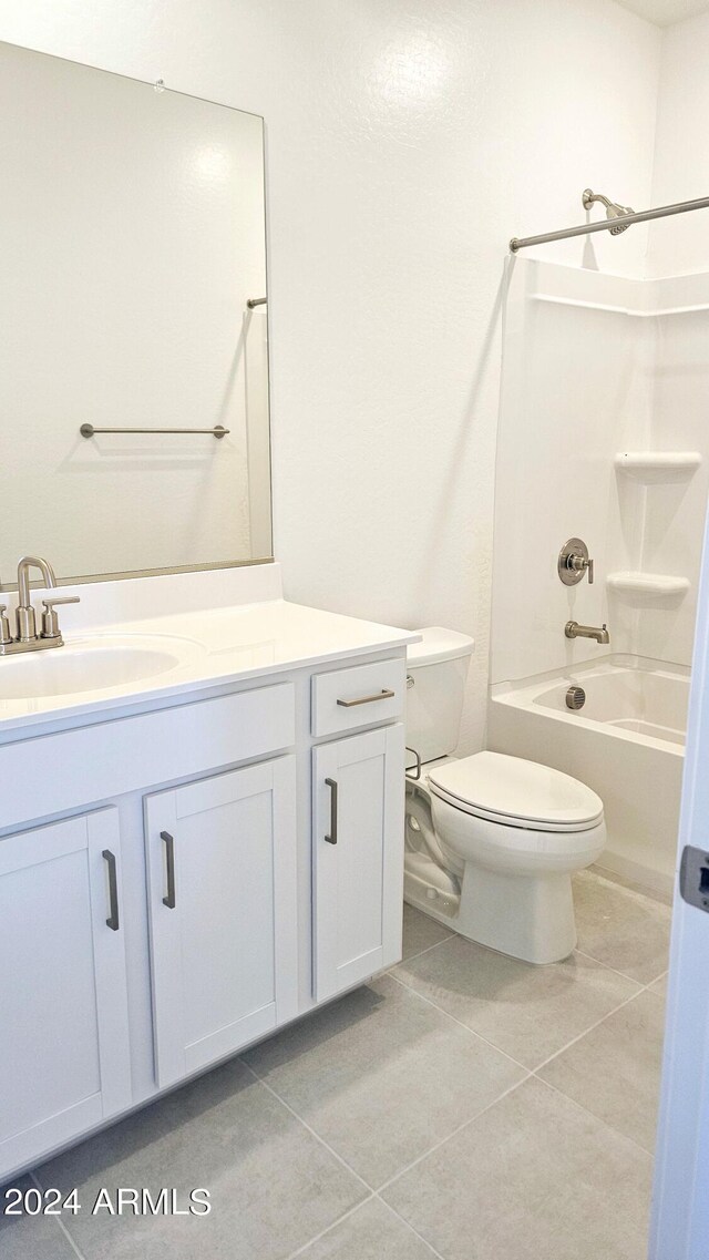 full bathroom with shower / bathtub combination, toilet, tile patterned floors, and vanity