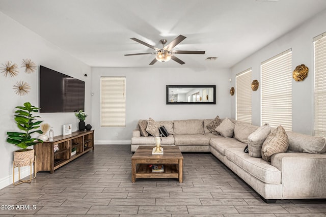 living room with ceiling fan