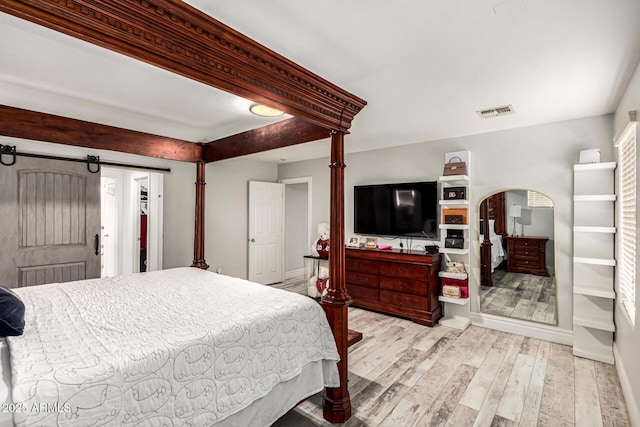 bedroom with light hardwood / wood-style flooring