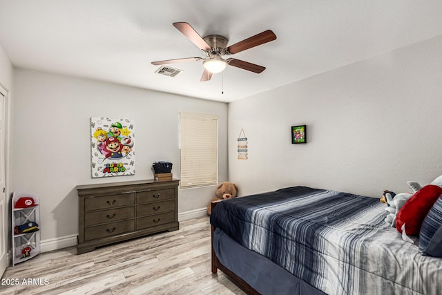 bedroom featuring ceiling fan and light hardwood / wood-style floors