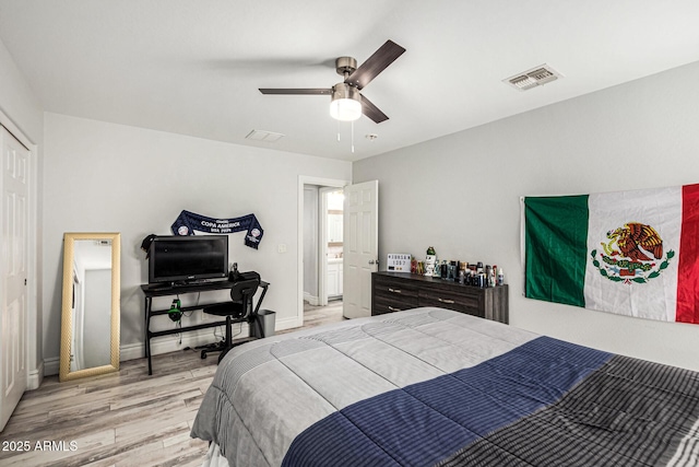 bedroom featuring ceiling fan and light wood-type flooring