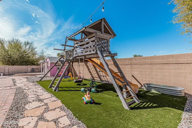 view of jungle gym with a yard