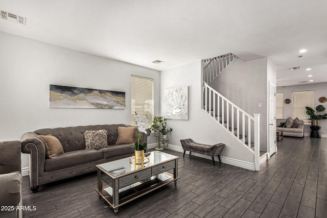 living room with dark hardwood / wood-style floors