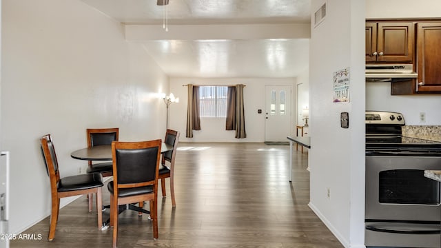 dining room with wood-type flooring