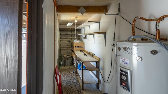 utility room with electric water heater