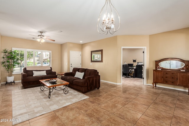 living room featuring light tile patterned flooring and ceiling fan with notable chandelier