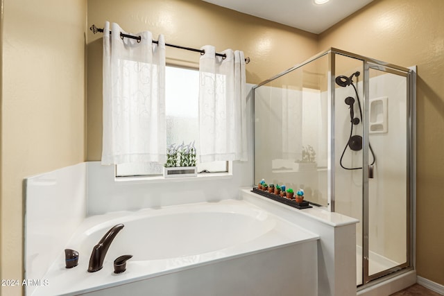 bathroom with plus walk in shower