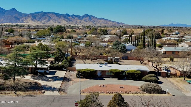 birds eye view of property featuring a mountain view