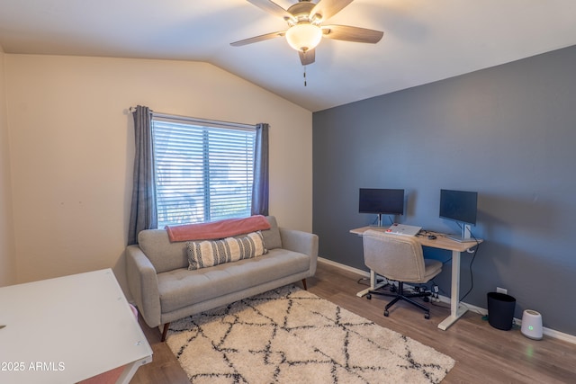 office space with hardwood / wood-style floors, vaulted ceiling, and ceiling fan