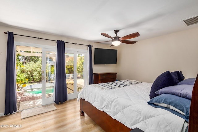 2256 S Las Flores, Mesa, AZ 85202 - bedroom featuring access to exterior, light wood finished floors, and ceiling fan