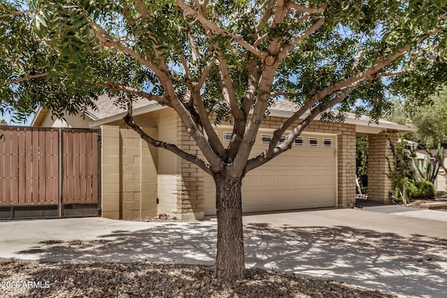 2256 S Las Flores, Mesa, AZ 85202 - view of front of house with an attached garage, driveway, and roof with shingles