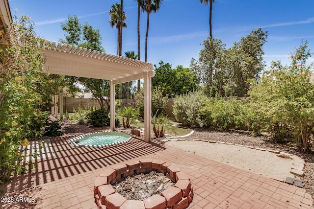 2256 S Las Flores, Mesa, AZ 85202 - fenced backyard featuring a patio, a pergola, an outdoor fire pit, and an in-ground hot tub