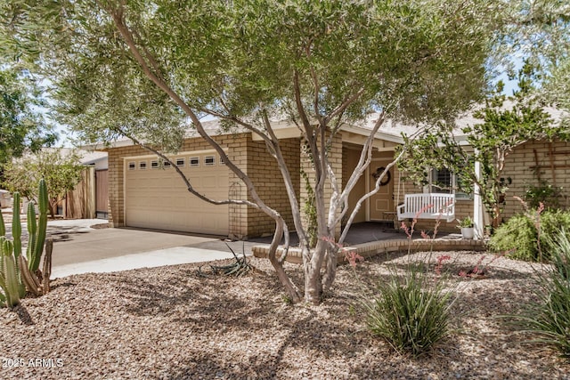 2256 S Las Flores, Mesa, AZ 85202 - view of front of property with driveway, an attached garage, and covered porch