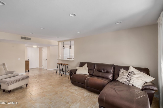 2256 S Las Flores, Mesa, AZ 85202 - living room with light stone finish floors, baseboards, and recessed lighting