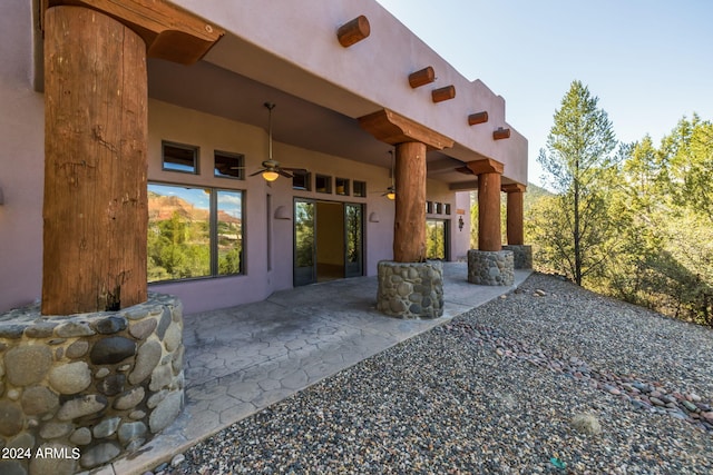 view of patio / terrace featuring ceiling fan