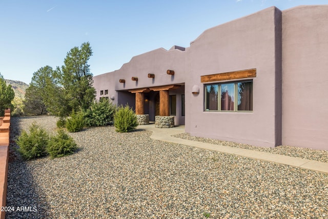 back of house featuring a patio area