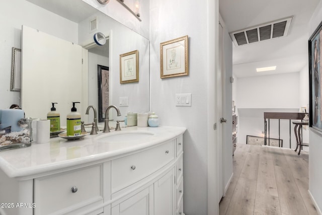 1401 E Puget Ave Unit 4, Phoenix, AZ 85020 - bathroom with vanity and wood finished floors