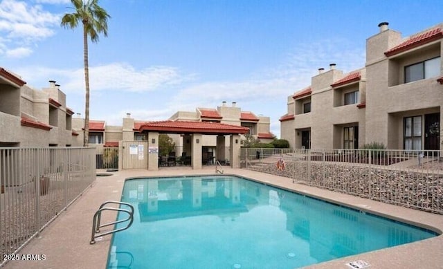 1401 E Puget Ave Unit 4, Phoenix, AZ 85020 - community pool with fence and a patio area