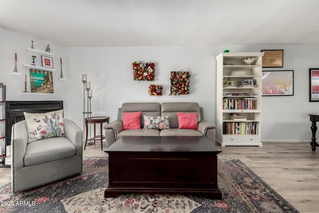 1401 E Puget Ave Unit 4, Phoenix, AZ 85020 - living room featuring wood finished floors and baseboards