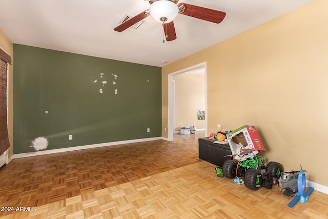 playroom with light parquet flooring and ceiling fan