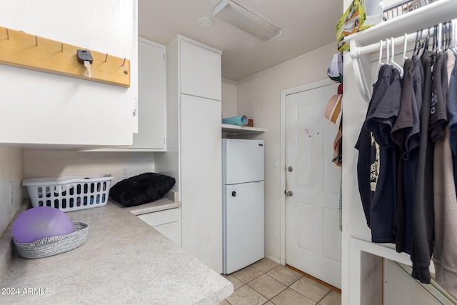 mudroom featuring light tile patterned floors