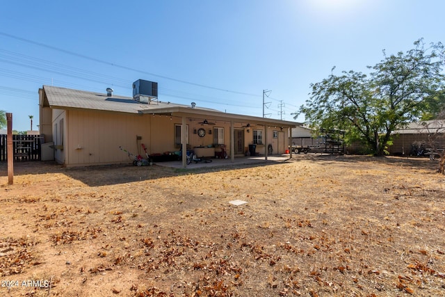 back of house with a patio area, ceiling fan, fence, and cooling unit