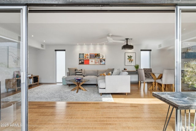 110 W Missouri Ave Unit 18, Phoenix, AZ 85013 - living area featuring wood finished floors, ceiling fan, and recessed lighting