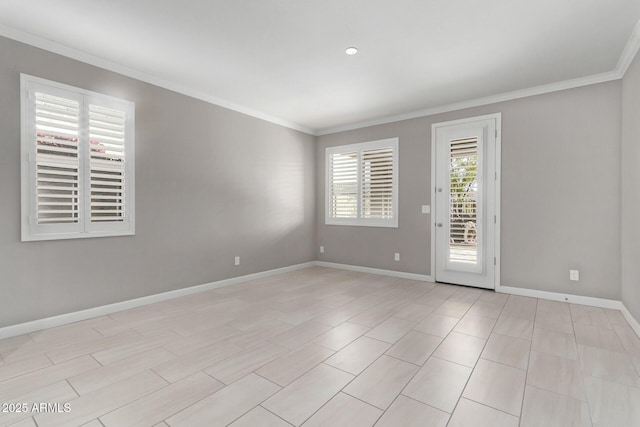 unfurnished room with ornamental molding