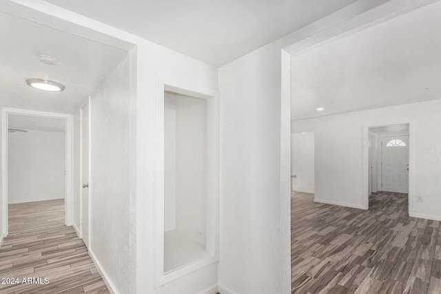 hallway featuring hardwood / wood-style flooring