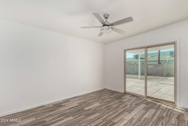 unfurnished room featuring ceiling fan and wood-type flooring