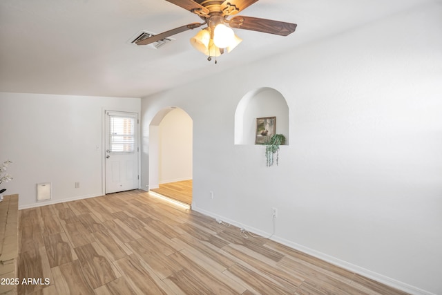 unfurnished room with ceiling fan and light hardwood / wood-style flooring