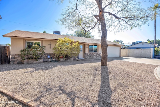 single story home with a garage