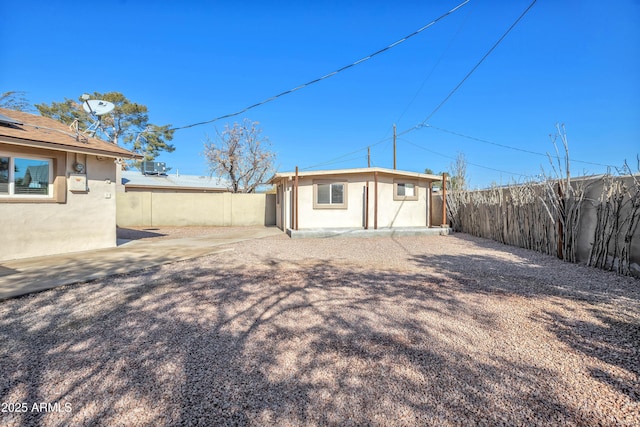 back of property with a patio area