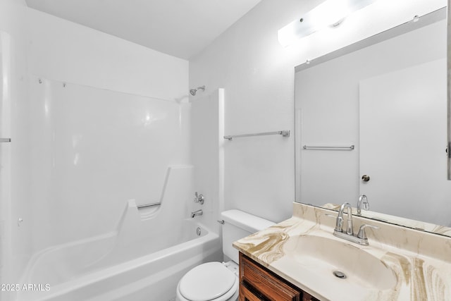 full bathroom featuring vanity, toilet, and washtub / shower combination