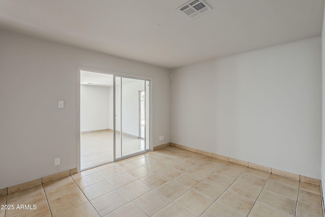 662 W Elena Ave, Mesa, AZ 85210 - empty room with light tile patterned floors