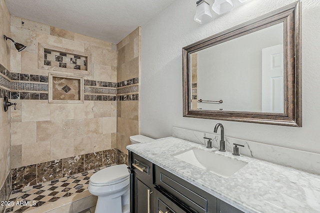 662 W Elena Ave, Mesa, AZ 85210 - full bath with vanity, a tile shower, and toilet