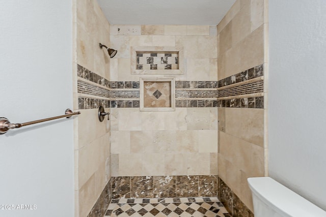 662 W Elena Ave, Mesa, AZ 85210 - bathroom featuring a tile shower and toilet