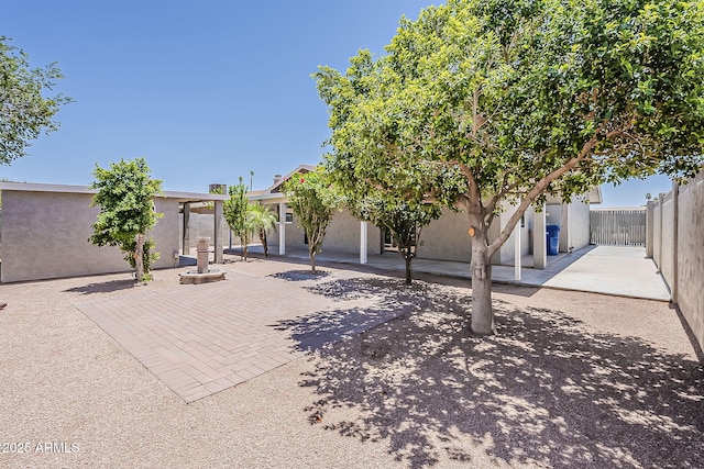 662 W Elena Ave, Mesa, AZ 85210 - rear view of house featuring a patio area, a fenced backyard, and stucco siding