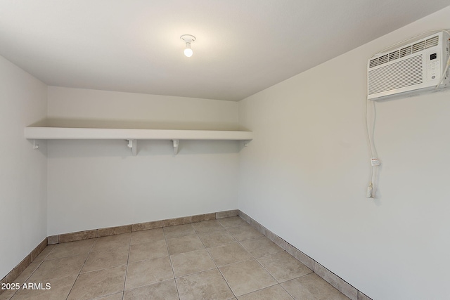 662 W Elena Ave, Mesa, AZ 85210 - walk in closet featuring a wall mounted air conditioner and light tile patterned flooring