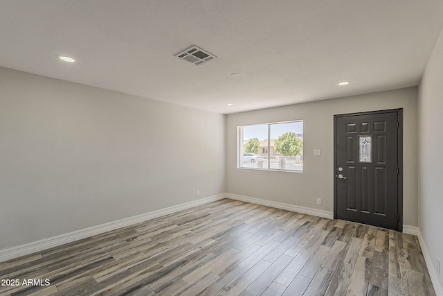 662 W Elena Ave, Mesa, AZ 85210 - entryway with wood finished floors, baseboards, and recessed lighting