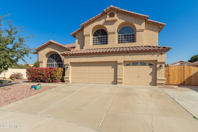 mediterranean / spanish-style house featuring a garage