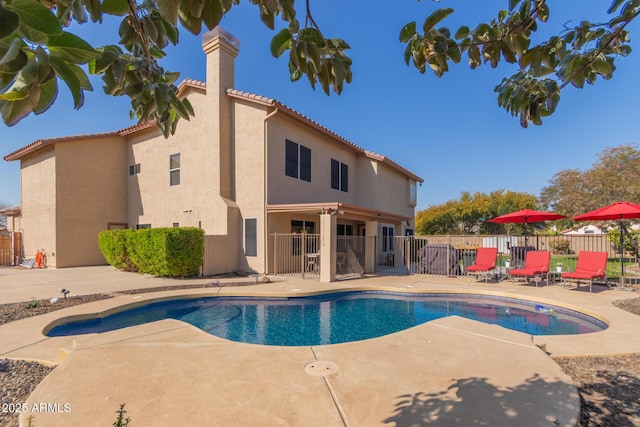 view of pool featuring a patio area