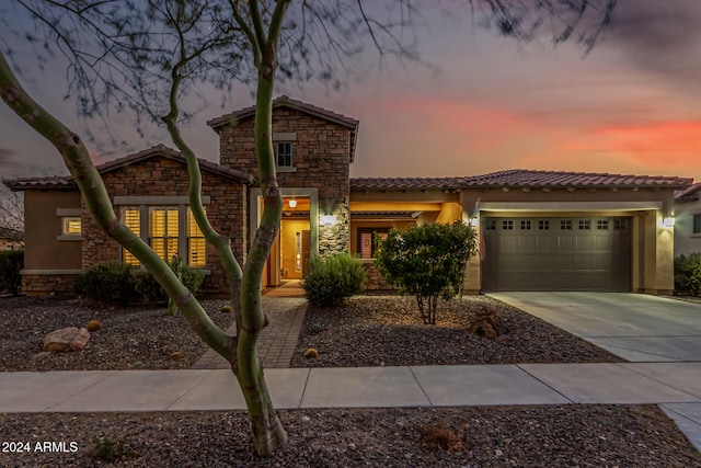 view of front of home featuring a garage