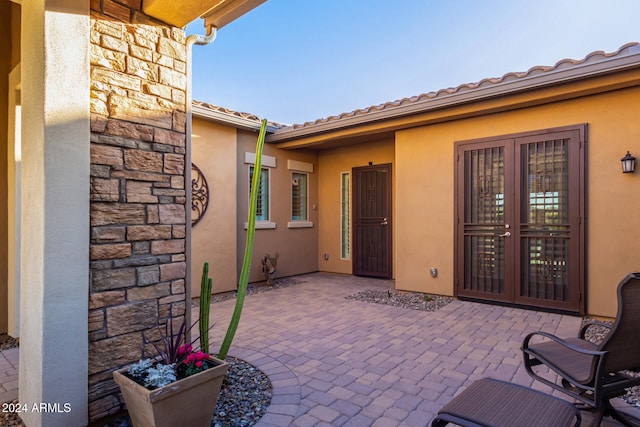 view of patio featuring french doors