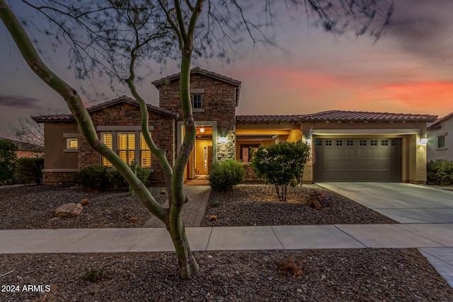 view of front of house with a garage