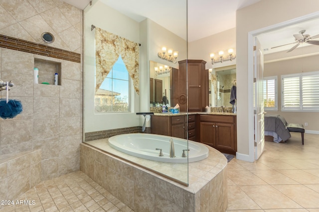 bathroom with shower with separate bathtub, vanity, tile patterned flooring, and ceiling fan