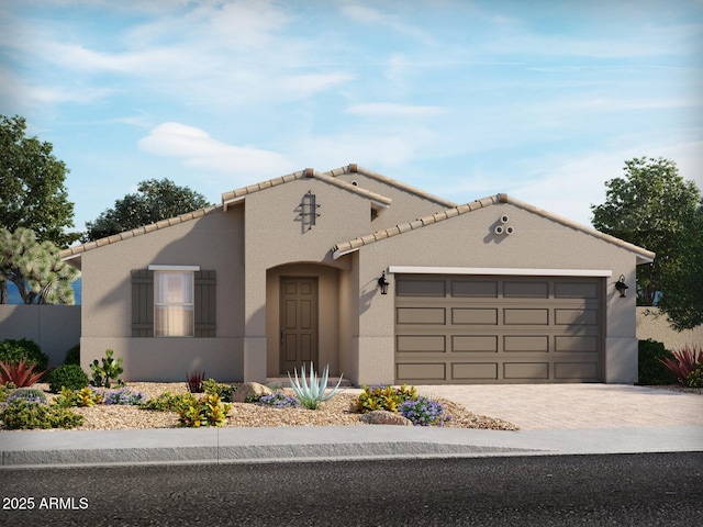 view of front of property with a garage