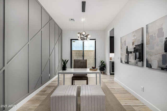 3822 E Canyon Pl, Chandler, AZ 85249 - office space with a chandelier, light wood-type flooring, and beverage cooler
