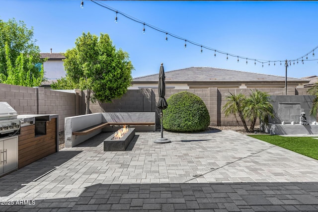 3822 E Canyon Pl, Chandler, AZ 85249 - fenced backyard featuring an outdoor fire pit, a patio area, and area for grilling