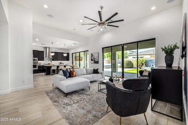 3822 E Canyon Pl, Chandler, AZ 85249 - living area featuring ceiling fan, light wood-style flooring, and recessed lighting